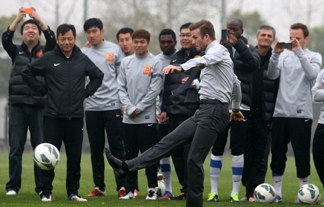 beckham fell down in china